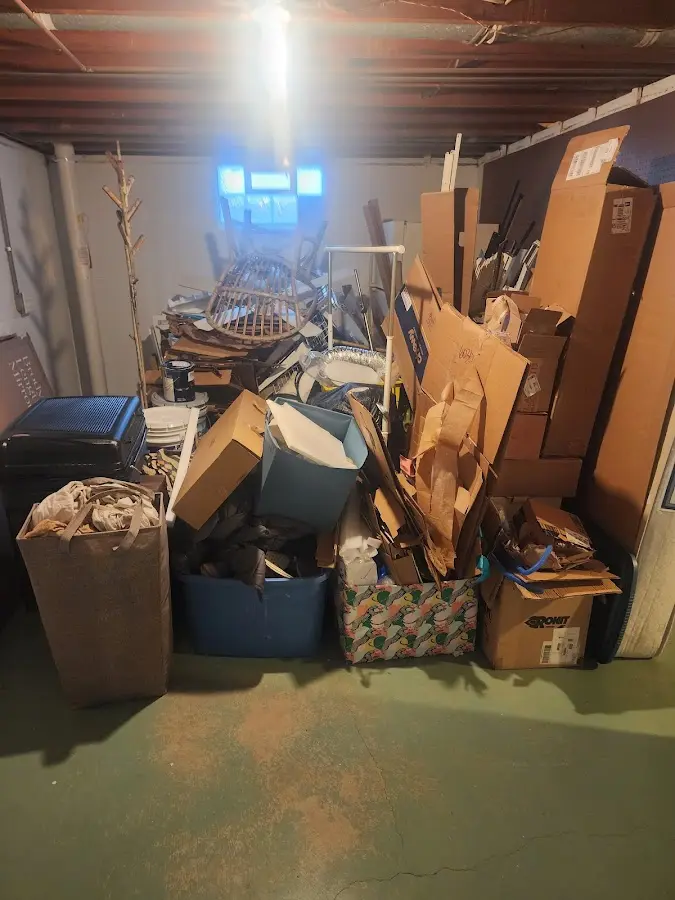 Roll-off dumpster container at job site for 2 Yard Dumpster Rental in Florence